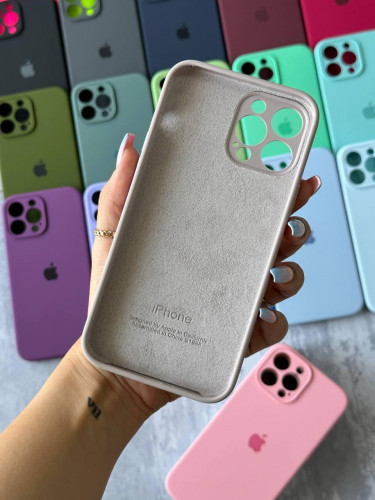 The original silicone case inside the fur of the iPhone 13