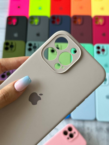 The original silicone case inside the fur of the iPhone 13