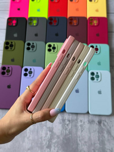 The original silicone case inside the fur of the iPhone 13