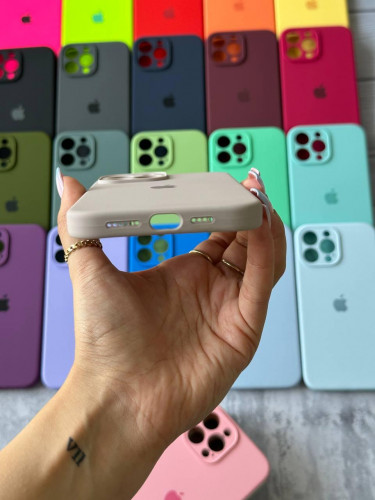 The original silicone case inside the fur of the iPhone 13